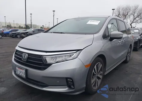 2021 Honda Odyssey Touring from USA, damaged, VIN 5FNRL6H88MB000217